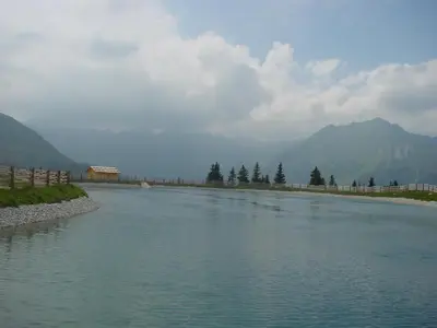 a river with mountains in the background at Residence Priska in Racines