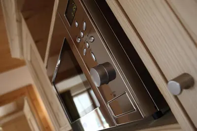 a close up of a door with a mirror at Apartments Sol E Nef in Rocca Pietore
