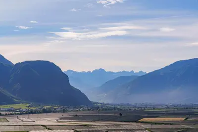 a view of a valley with mountains in the background at Ferienwohnungen Wieserhof in Andrian in Andrian