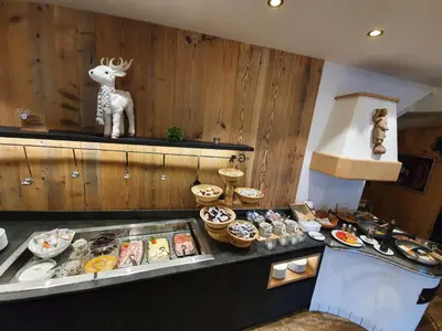 a buffet with many different types of food on display at Hotel Andechserhof & Mountain Sky in Laion