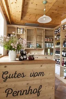 a bar in a wine shop with a sign that reads cities town permutation at Hotel-Chalet Pennhof in Barbiano
