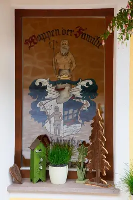 a picture of a statue of a man in a painting at Residence Ulrike in Nova Levante
