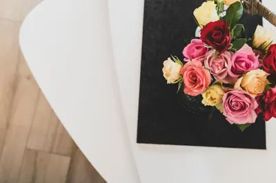 a painting of a bouquet of flowers on a wall at Falgerhof in Vollan