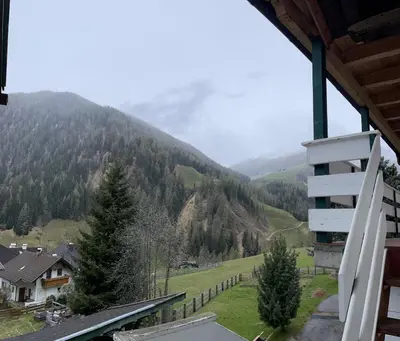 a view of a mountain from the balcony of a house at Alpen Ferienwohnung II in Lappago
