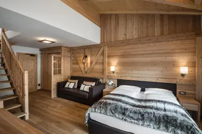 a bathroom with a sink and a shower at Alpenhotel Plaza in Santa Cristina in Val Gardena