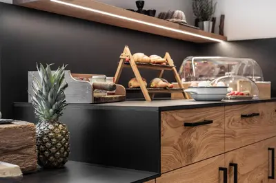 a counter with a pineapple sitting on top of it at Garni Hotel Tauber in Bressanone