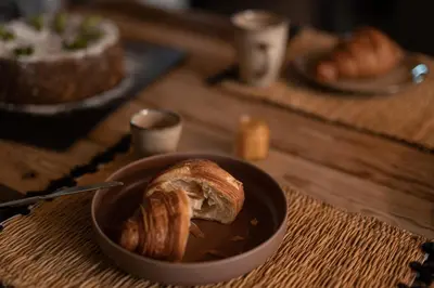 a close up of eggs and bread in an oven at Landpalais Goyenhof - Deluxe Suites & Breakfast in Schenna