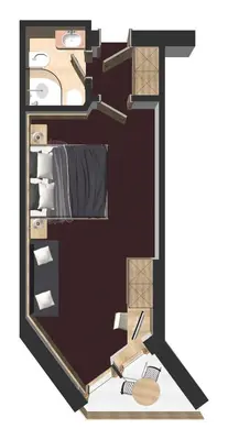 a floor plan of a room with furniture at Hotel Condor in Selva di Val Gardena