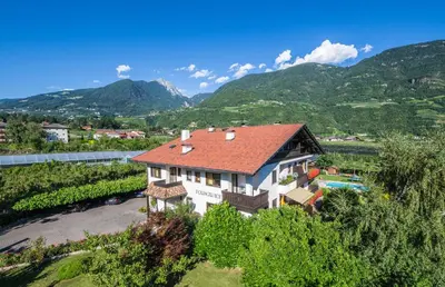 an aerial view of a house in a vineyard at Residence Pollingerhof in Merano