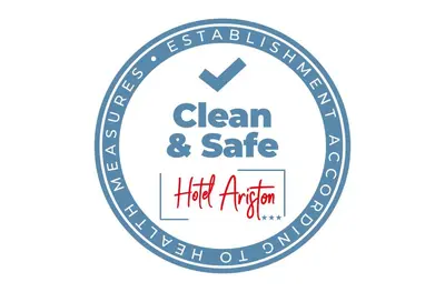 a vector illustration of a clean and safe label at Hotel Ariston in Bolzano