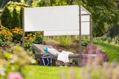 a large white basketball hoop in a garden at Hotel Kiendl in Schenna