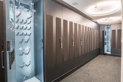 a row of lockers in a locker room at Hotel Plan de Gralba - das Berghotel in Selva di Val Gardena