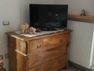 a dresser with two stuffed animals sitting on top of it at HartlHof in Proves