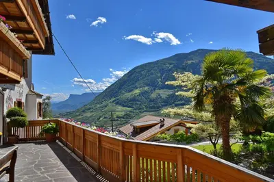 a balcony with a view of a mountain at Residence Blumenthalerhof in Lagundo