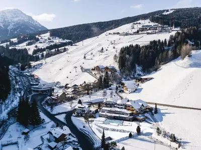 an aerial view of a ski resort in the snow at Hotel Christoph in Valdaora