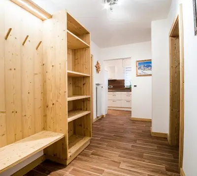 a room with wooden walls and wooden floors at Apartment Rainer in Ortisei