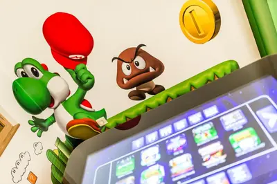 a computer screen with mario games on it at Romantik & Family Hotel Gardenia***S in Selva di Val Gardena