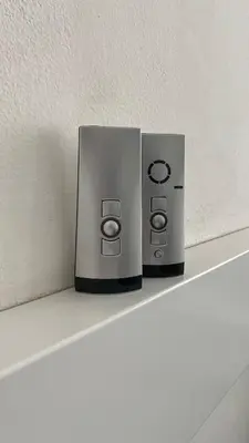 two metal objects sitting on top of a shelf at Life Apartment & City Bike in Bolzano
