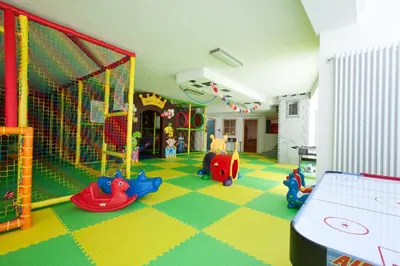 a play room with toys on the floor at Resort Dolce Casa - Family & Spa Hotel in Moena