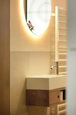 a bathroom with a sink and a mirror at Appartement Karnutsch in Schenna