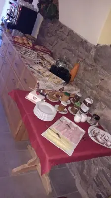 a table with plates of food on top of it at Maso Valfloriana in Valfloriana