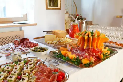 a buffet with many different types of food on a table at Ciasa Roby in San Cassiano