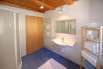 a bathroom with a sink and a mirror at La Vinea in Caldaro