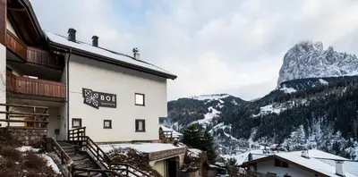 a hotel with a view of a mountain at Apartments Boè in Santa Cristina in Val Gardena