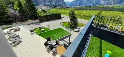 arial view of a patio with a view of a courtyard at Hotel Comfort Erica Dolomiti Val d'Adige in Salorno sulla Strada del Vino