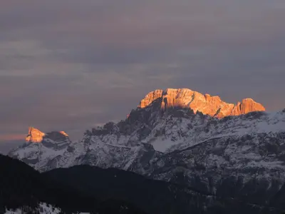 a view of a mountain with snow on it at Casa De Biasio PM in Falcade