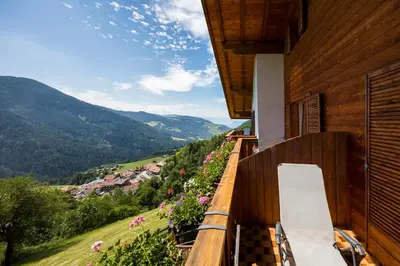 a balcony of a house with a view of a valley at Thalerhof Tiers in Tires