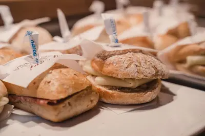 a group of sandwiches sitting on a table at FIORI Dolomites Experience Hotel in San Vito di Cadore