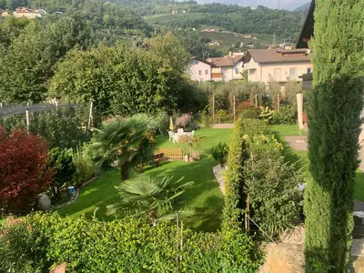 an aerial view of a garden with trees and bushes at Haus Sankt Peter in Lana