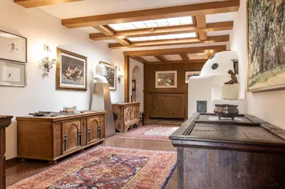 a kitchen with a wooden island in a room at Chalet Luis in Falzes