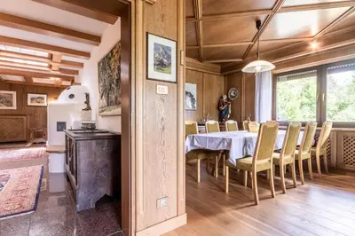 a dining room with a table and chairs at Chalet Luis in Falzes