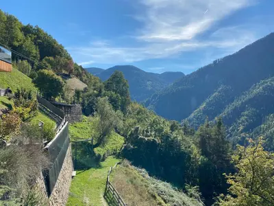 a view of a valley with mountains in the background at Brentwaldhof Appartements in Cornedo all'Isarco