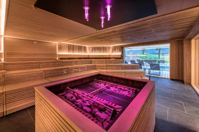 a large tub filled with pink chickens in a room at Weinegg Wellviva Resort in Appiano sulla Strada del Vino