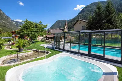 an image of a swimming pool in a house at Zur Brücke apartments and rooms - Your home in heart of South Tyrol, with Brixencard in Fortezza