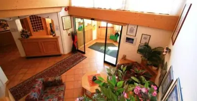 an overhead view of a living room with at Hotel Miramonti in Vigo di Fassa