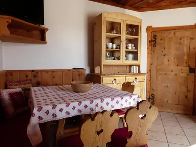 a kitchen with a table with a bowl on it at Maso Pinterato in Cavalese