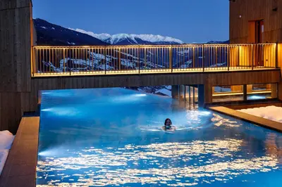 a large body of water with mountains in the background at Chalet Gratznhäusl in Ridanna