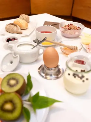 a kitchen with a counter with food on it at Hotel Erna in Colle Isarco
