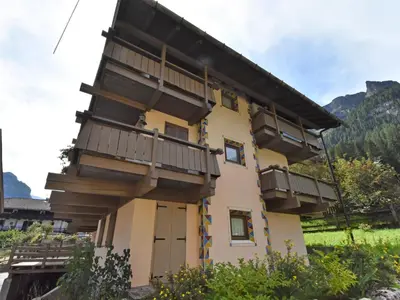 a building with balconies on the side of it at Apartment Fontanelle-1 by Interhome in Alba di Canazei
