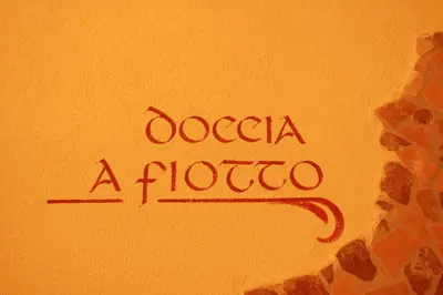 a sign that says ocoa a florence on a wall at Residence Pez Gajard in San Martino di Castrozza