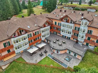 an overhead view of a large building with a courtyard at Residence Pez Gajard in San Martino di Castrozza