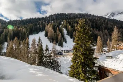 a view of a ski resort in the snow at Residence Civetta in Val di Zoldo