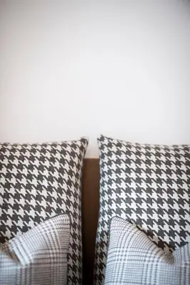 two pillows sitting next to each other on a couch at Villa Aurelia in Ortisei