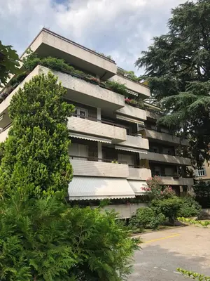 an apartment building with plants on the side of it at Residenza XXX Aprile in Merano