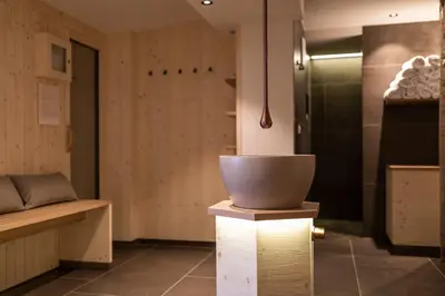 a kitchen with a bowl on a stand in a room at Berghotel Schlemmer in Bressanone