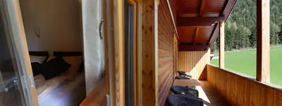 an inside view of a tiny house with a window at Chalet Rasteck in Campo Tures